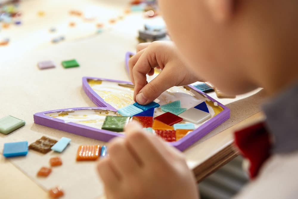 mosaic-puzzle-art-kids-children-s-creative-game-hands-are-playing-mosaic-table-colorful-multi-colored-details-close-up-creativity-children-s-development-learning-concept mosaic-puzzle-art-kids-children-s-creative-game-hands-are-playing-mosaic-table-colorful-multi-colored-details-close-up-creativity-children-s-development-learning-concept
